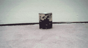 A soup can covered in a painted canvas