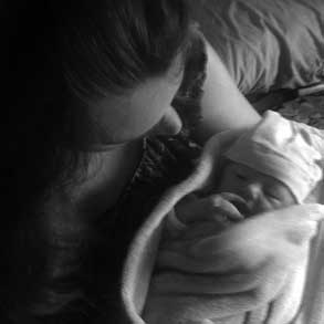 Jennifer holds her newborn son